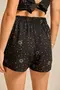 SHORT SAIA VISCOSE ESTAMPADA COM CORDINHA DE VIÉS NA LATERAL E PONTEIRA