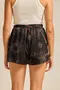 SHORT VISCOSE ESTAMPADA COM BOLSO E CORDINHA DE VIÉS COM PONTEIRA