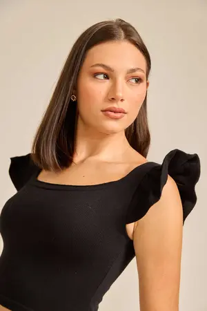TRICOT COM BABADOS PRETO P