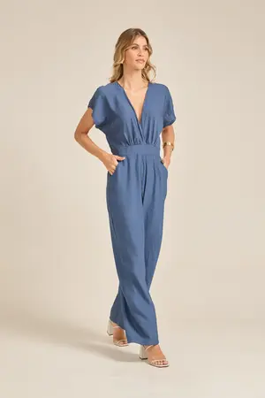 MACACÃO COM TRANSPASSE AZUL JEANS P