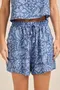 SHORT VISCOSE ESTAMPADA COM BOLSO E CORDINHA DE VIÉS