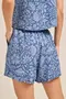SHORT VISCOSE ESTAMPADA COM BOLSO E CORDINHA DE VIÉS