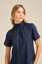 BLUSA VISCOSE LISA COM GOLA ALTA DE LASTEX E MANGA CURTA BUFANTE