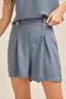 SHORT EM TWILL COM MARTINGALE E BOTÕES