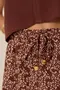 SHORT COM CORDINHA DE VIÉS E PONTEIRA