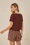 SHORT COM CORDINHA DE VIÉS E PONTEIRA