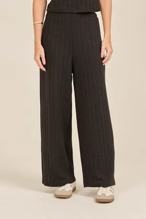CALÇA EM CANELADO QUADRADOS PRETO G