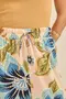 CALÇA JOGGER COM BOLSO ESTAMPA DOCE FLORAL BEGE